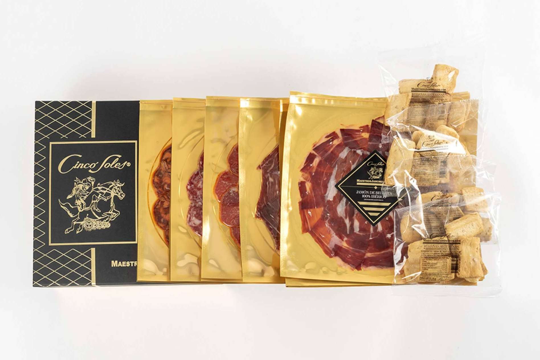 Lotes de Jamón de Bellota ibéricos cortado a cuchillo, por Maestros Jamoneros, uno de los regalos corporativos más buscados para esta Navidad